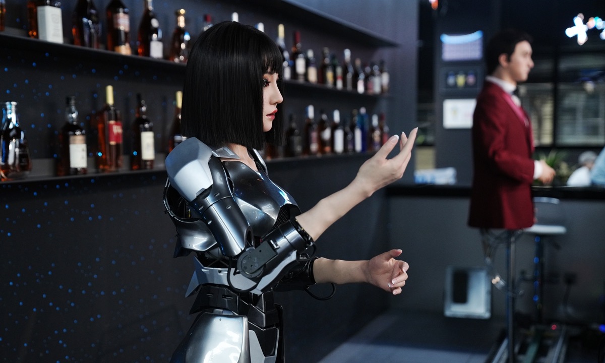 A humanoid service robot is seen at the front desk of a restaurant inside the world’s first humanoid robot 4S store, Robot Mall, in Yizhuang, Beijing on August 4, 2025. Photo: VCG